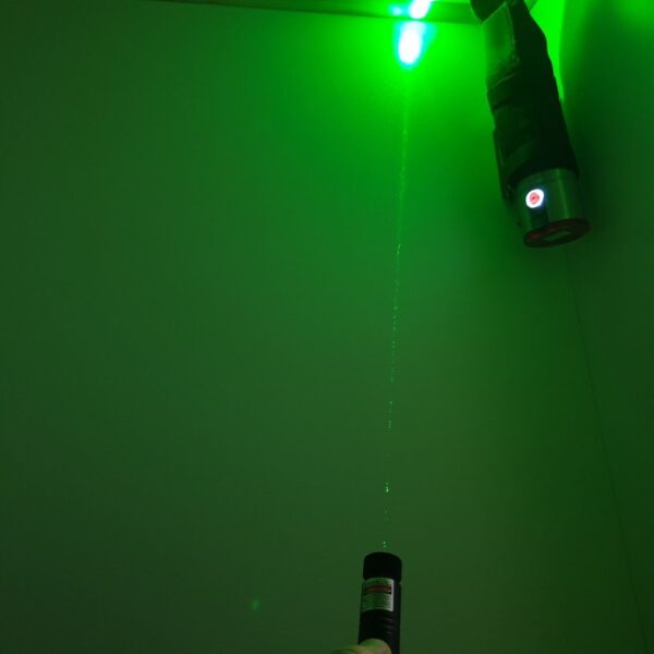 Salt Booth - Green Laser showing Salt Aerosol passing through the beam.