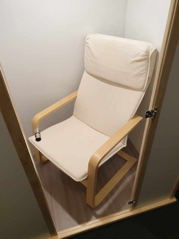 Salt Booth with Salt Tile Feature one side and Clear Window other side with recliner