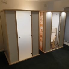 Salt Booths - Left Unit Full side panels and Opaque Door - Right Unit with Salt wall tile feature and clear window and clear door.