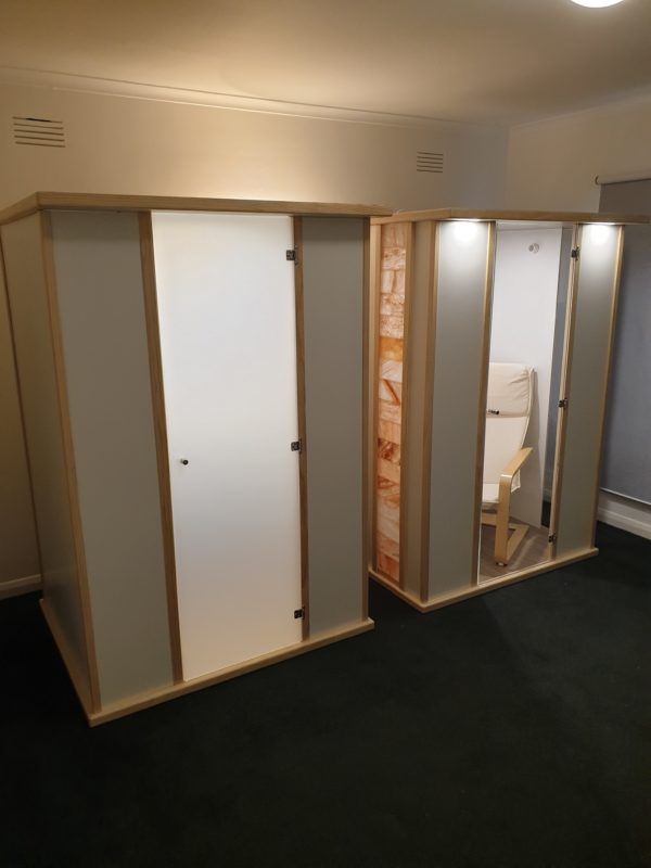 Salt Booths - Left Unit Full side panels and Opaque Door - Right Unit with Salt wall tile feature and clear window and clear door.