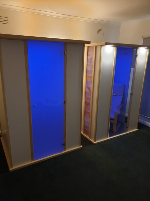 Salt Booths - Left Unit Full side panels - Right Unit Salt wall tile feature and clear window - Blue Lighting